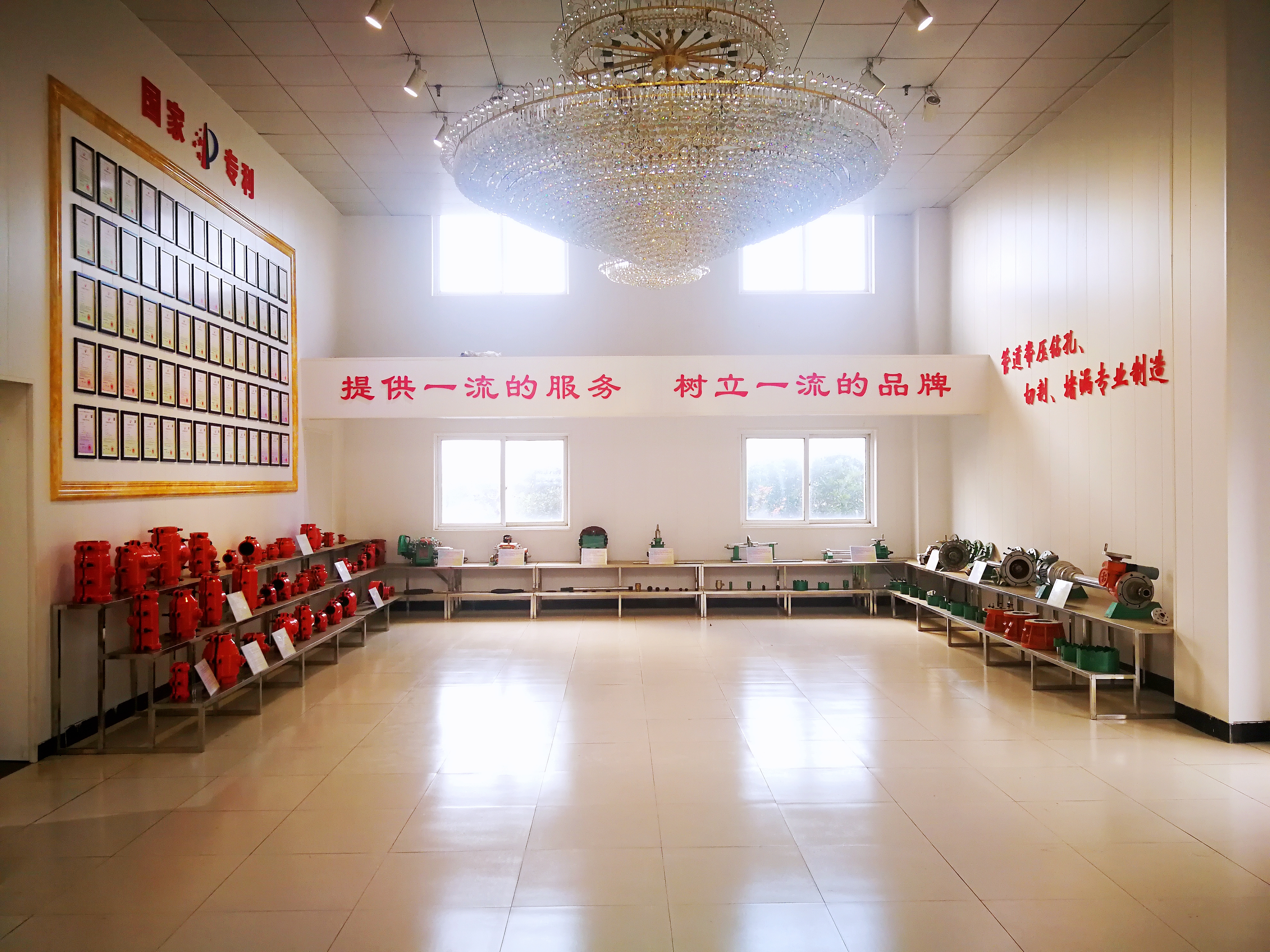 Anhui Tongfa product showroom displaying the full range of pipe repair clamps and patent certificates